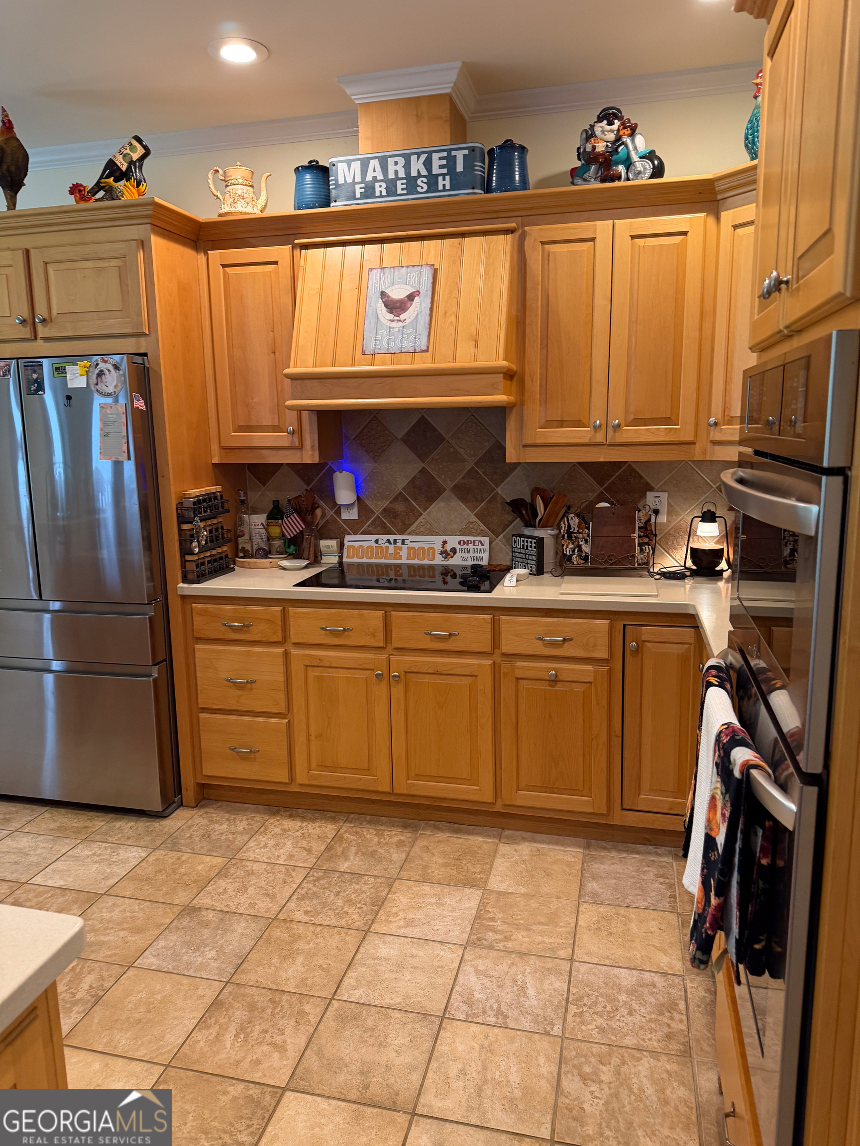 3385 Highway 83 Monticello, GA 31064 - Photo 41 of 47 a kitchen with a sink a stove and cabinets