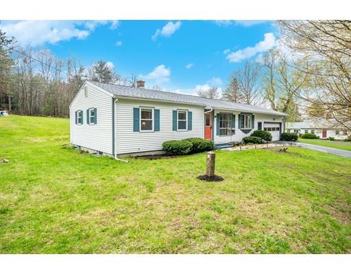 11 Enfield Road Pelham, MA 01002 - Photo 1 of 28 a front view of a house with a yard