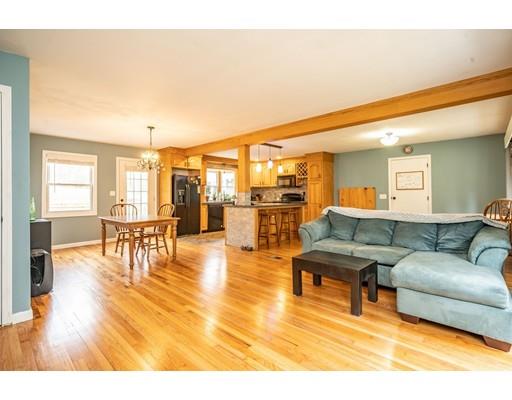 11 Enfield Road Pelham, MA 01002 - Photo 16 of 28 a living room with furniture and a table