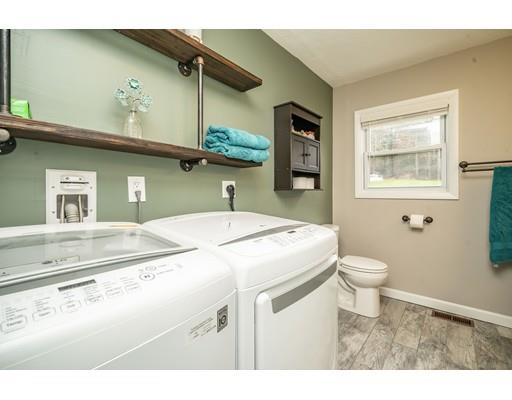 11 Enfield Road Pelham, MA 01002 - Photo 20 of 28 a bathroom with a sink a toilet and vanity