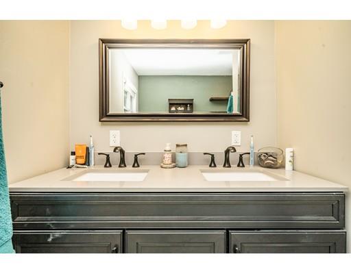 11 Enfield Road Pelham, MA 01002 - Photo 21 of 28 a bathroom with a sink and a mirror