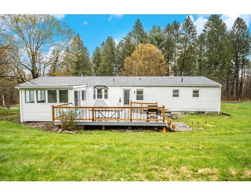11 Enfield Road Pelham, MA 01002 - Photo 26 of 28 a view of a house with a yard and sitting area