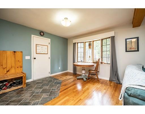 11 Enfield Road Pelham, MA 01002 - Photo 4 of 28 a living room with a bed furniture and a window