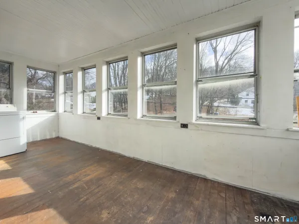 an empty room with windows