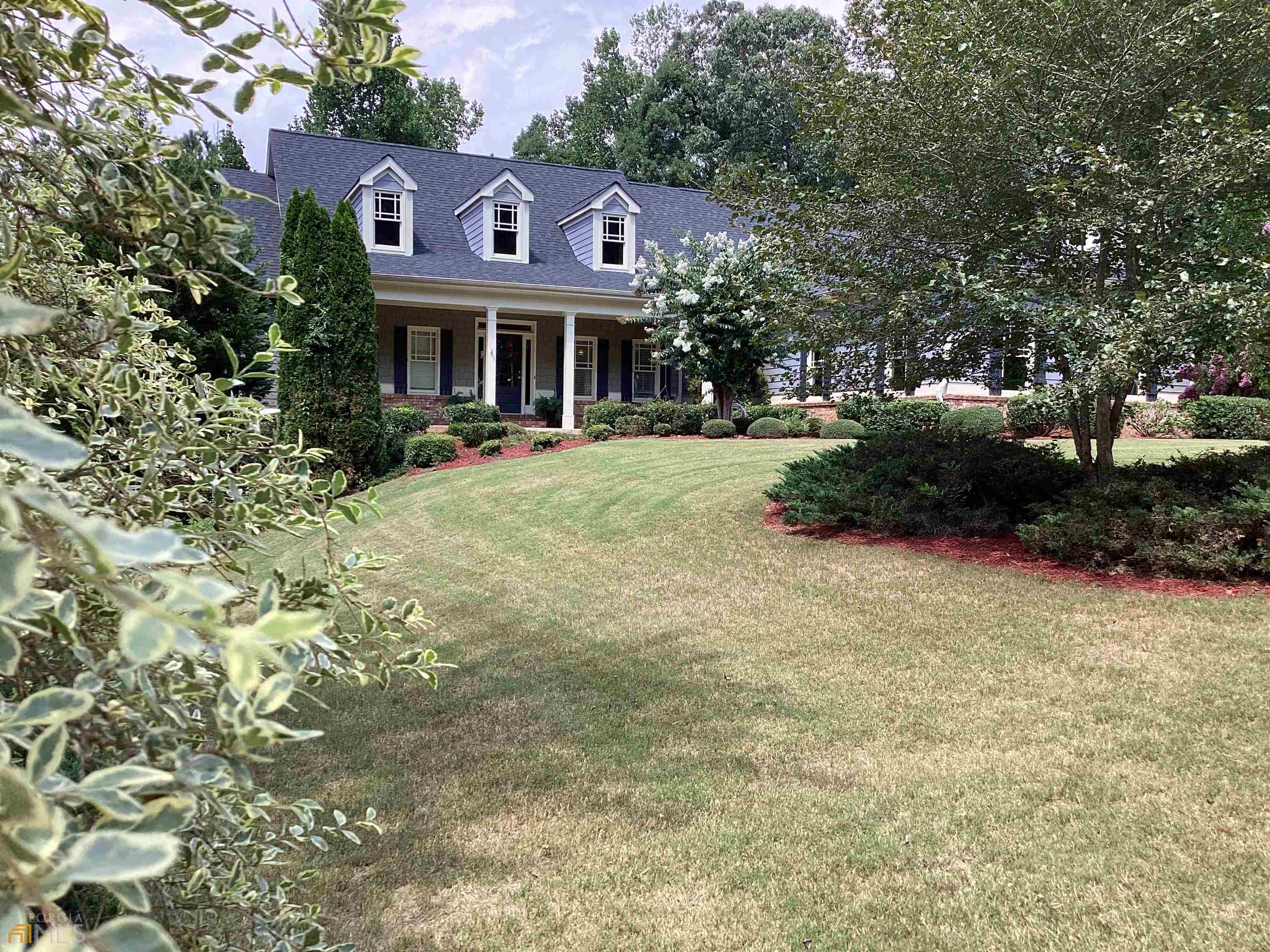 110 New Cut Road Winder, GA 30680 - Photo 1 of 1 a front view of a house with yard and green space