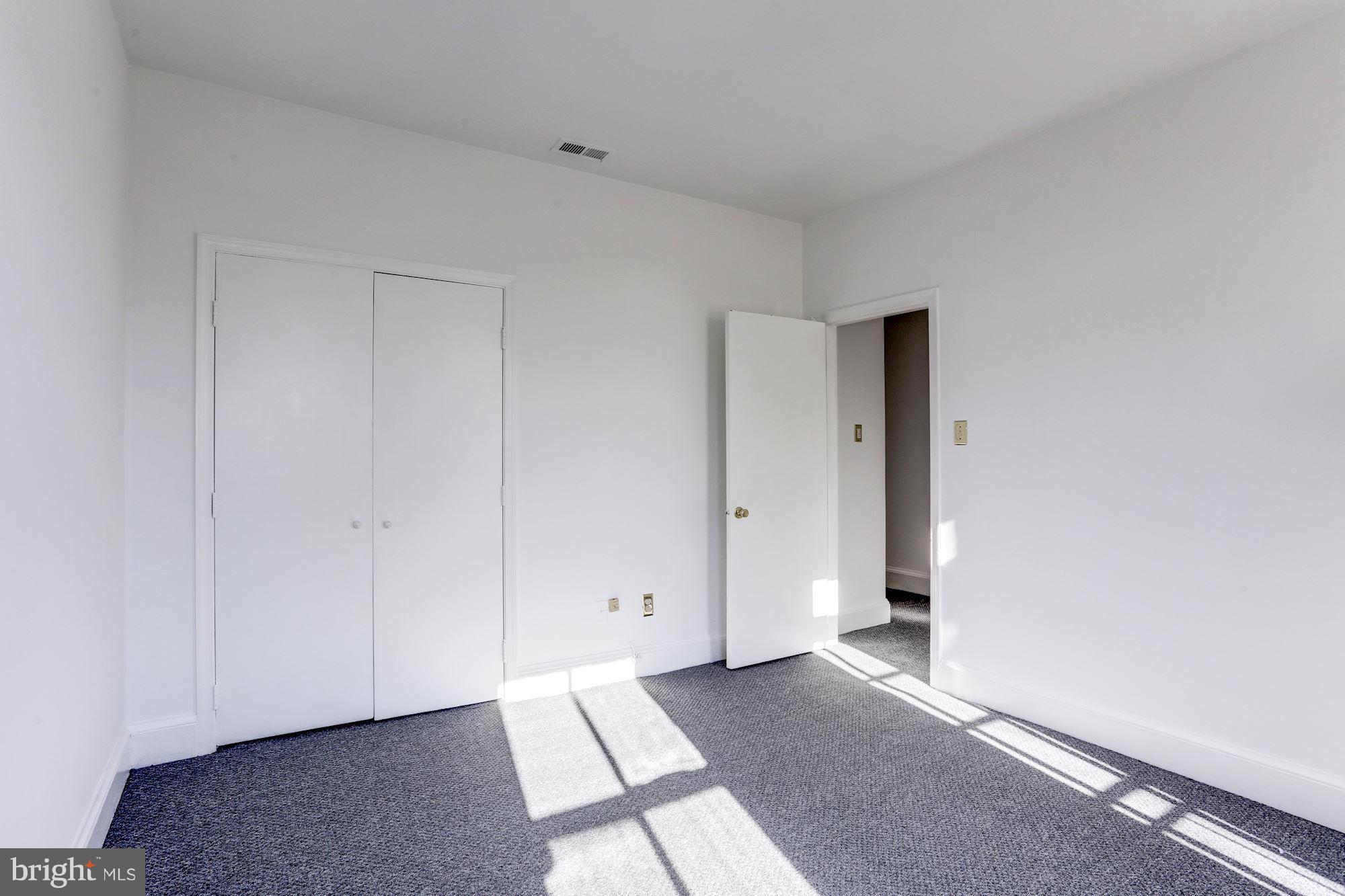 3022 R Street Northwest, Unit 3 Washington, DC 20007 - Photo 16 of 24 Bright afternoon sun in master bedroom.