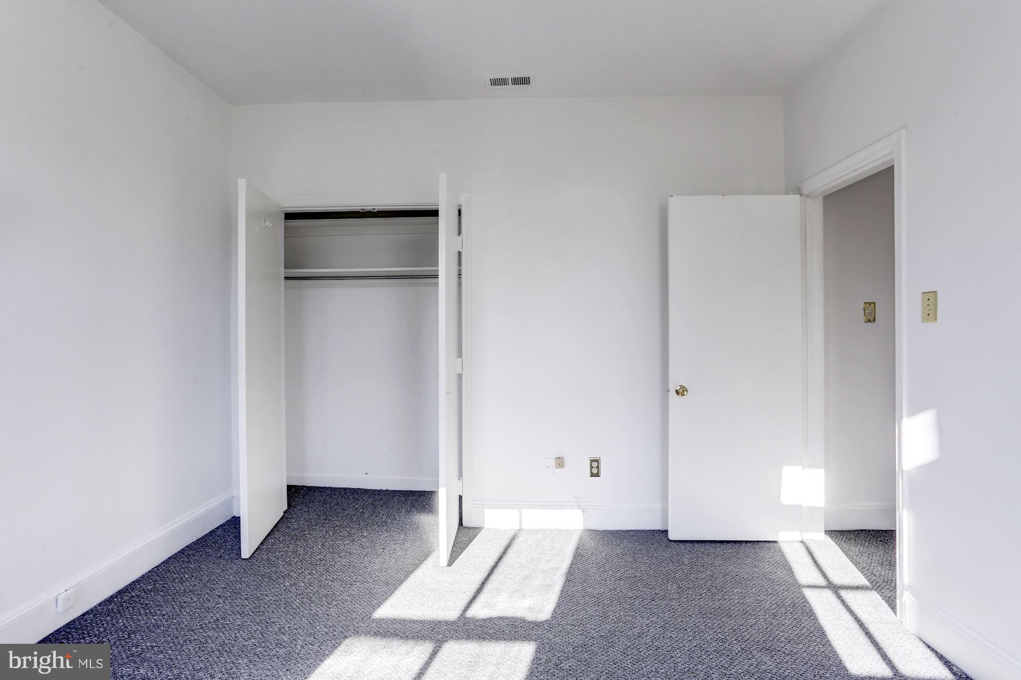 3022 R Street Northwest, Unit 3 Washington, DC 20007 - Photo 17 of 24 Master bedroom with a view of closet.