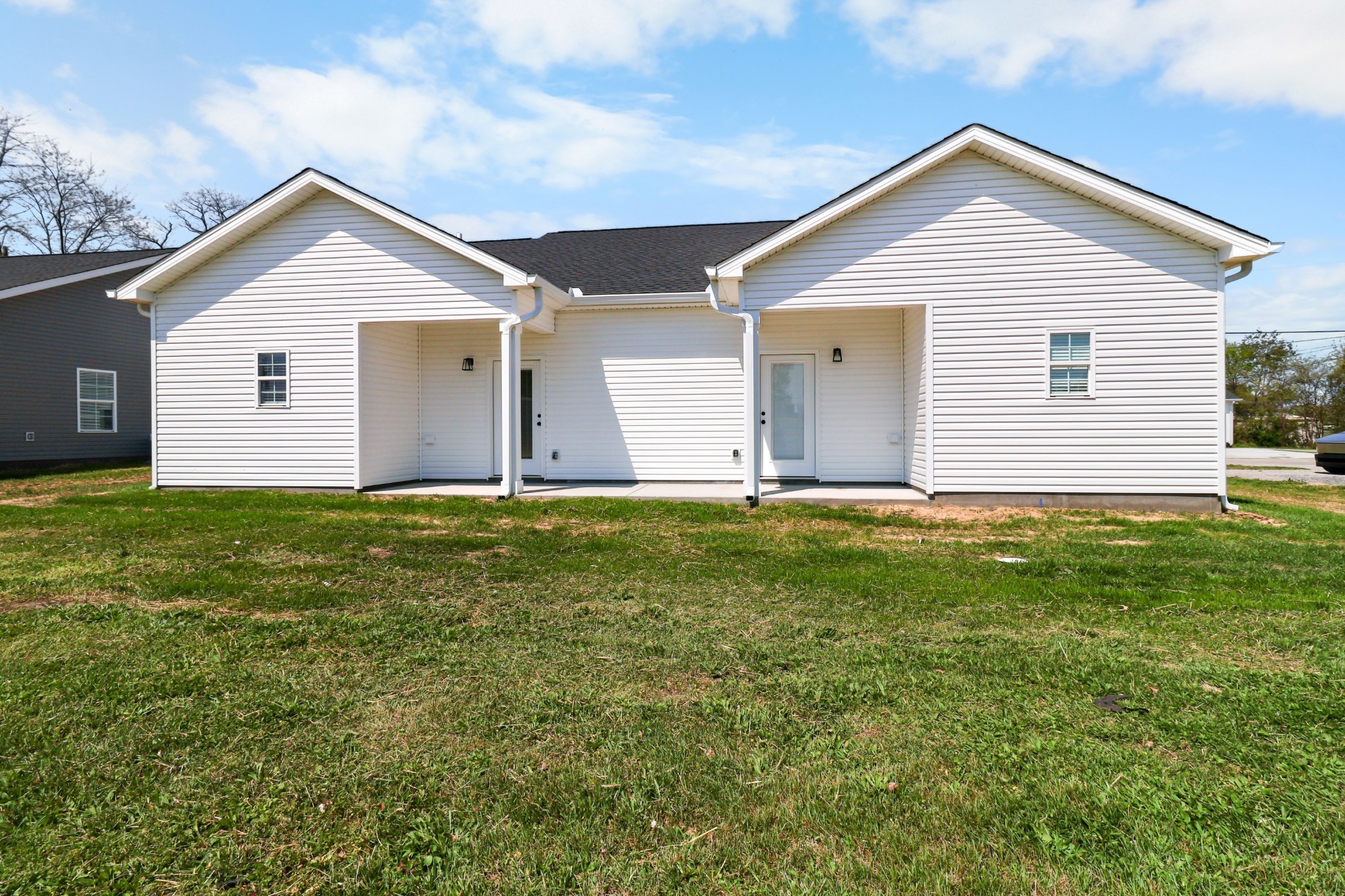 1003 Oak Street, Unit B Portland, TN 37148 - Photo 24 of 29 a front view of house with yard and green space