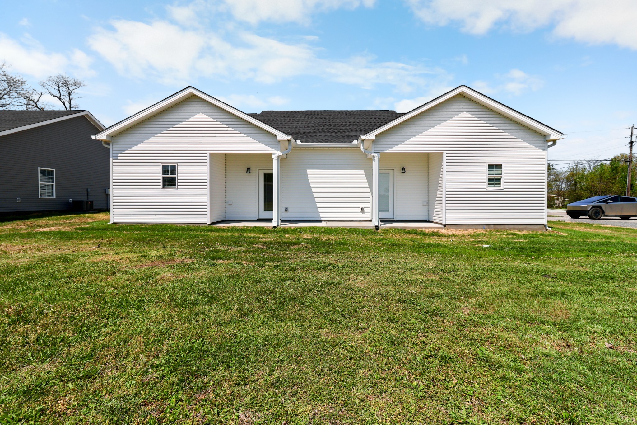 1003 Oak Street, Unit B Portland, TN 37148 - Photo 25 of 29 a view of a house with yard and garden