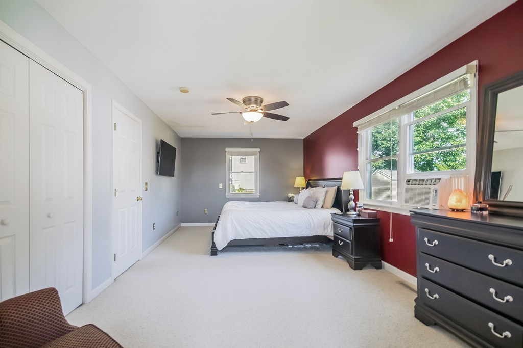 46 Gates Avenue Springfield, MA 01118 - Photo 14 of 26 a bed room with a bed and a window