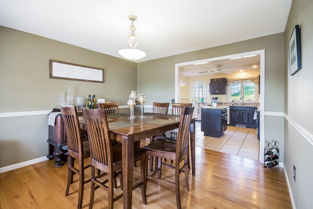 46 Gates Avenue Springfield, MA 01118 - Photo 3 of 26 a view of a dining room with furniture and wooden floor