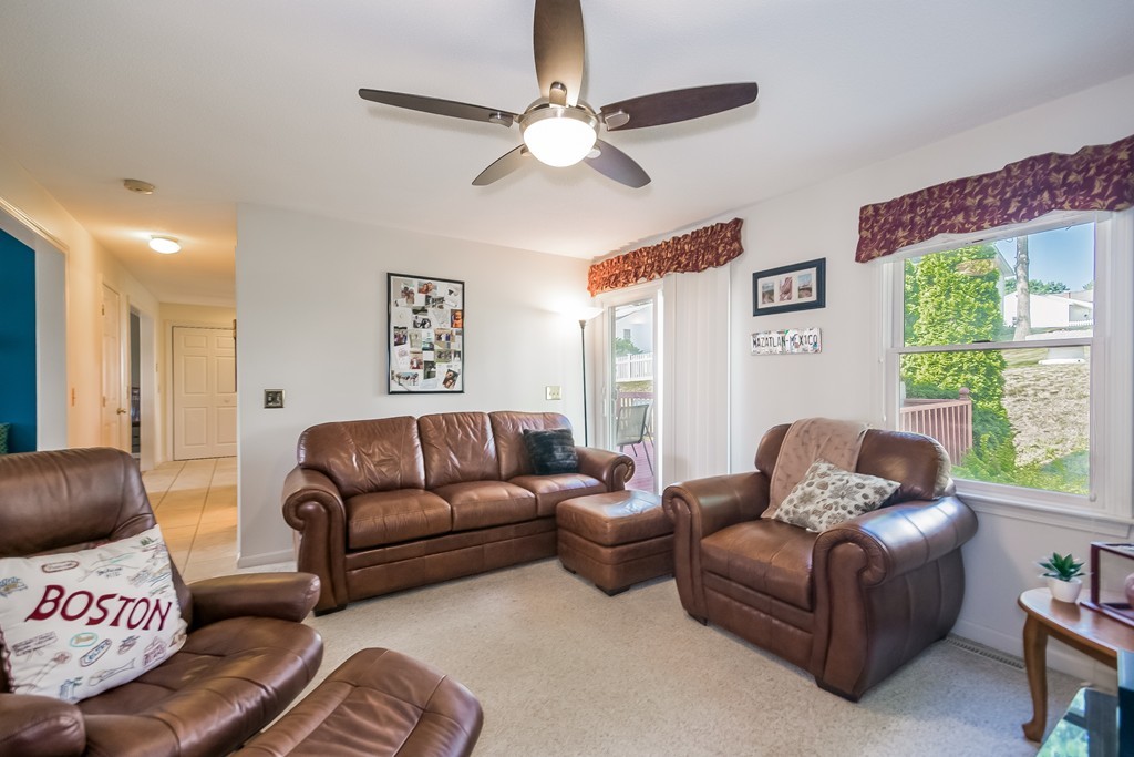 46 Gates Avenue Springfield, MA 01118 - Photo 5 of 26 a living room with furniture and a large window