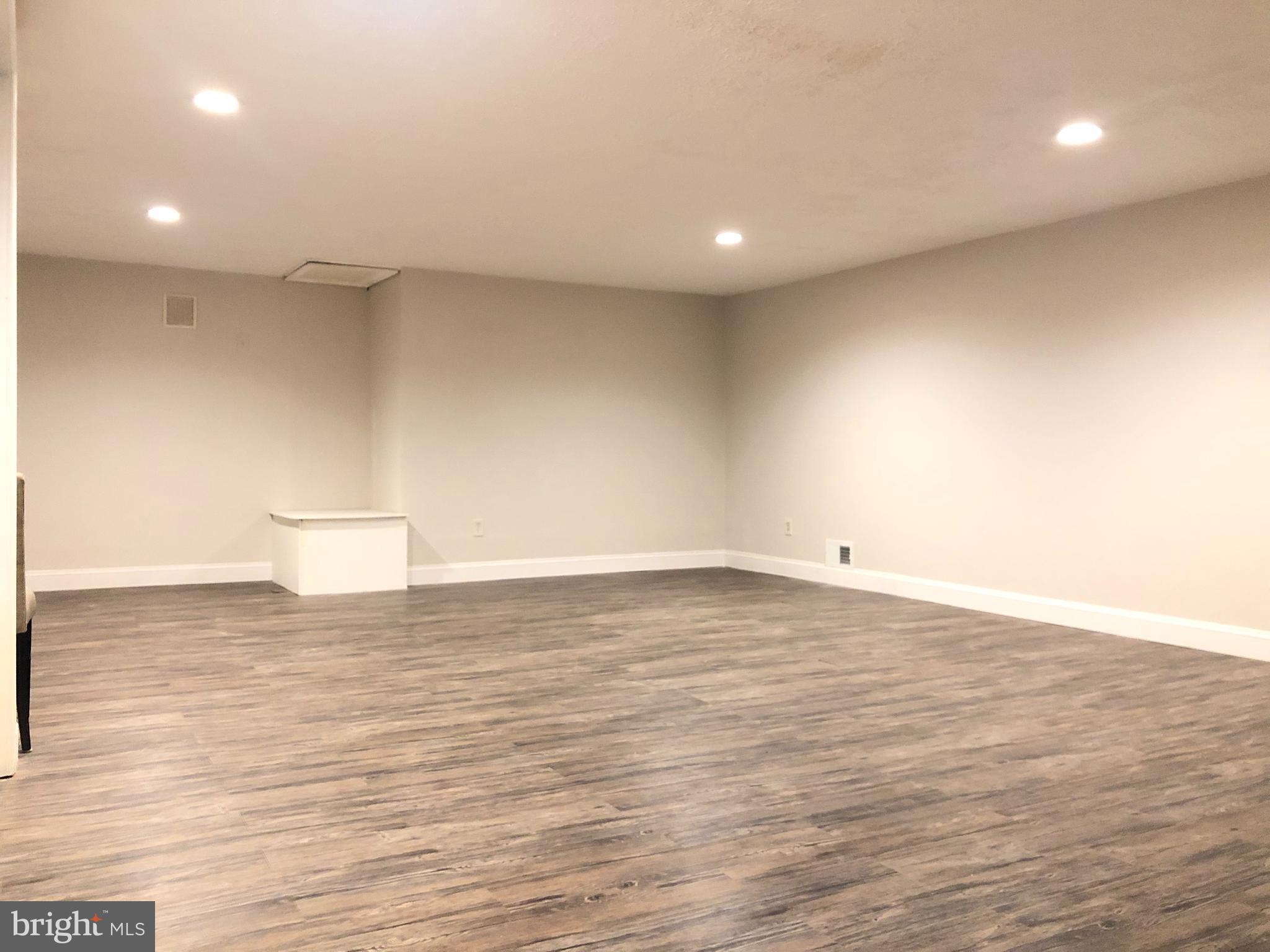 5 Algonquin Court Chesterbrook, PA 19087 - Photo 17 of 18 a view of empty room with wooden floor