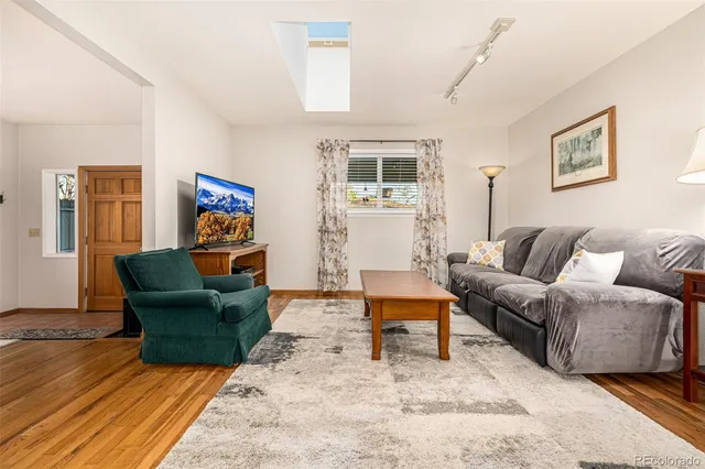 a living room with furniture and a couch