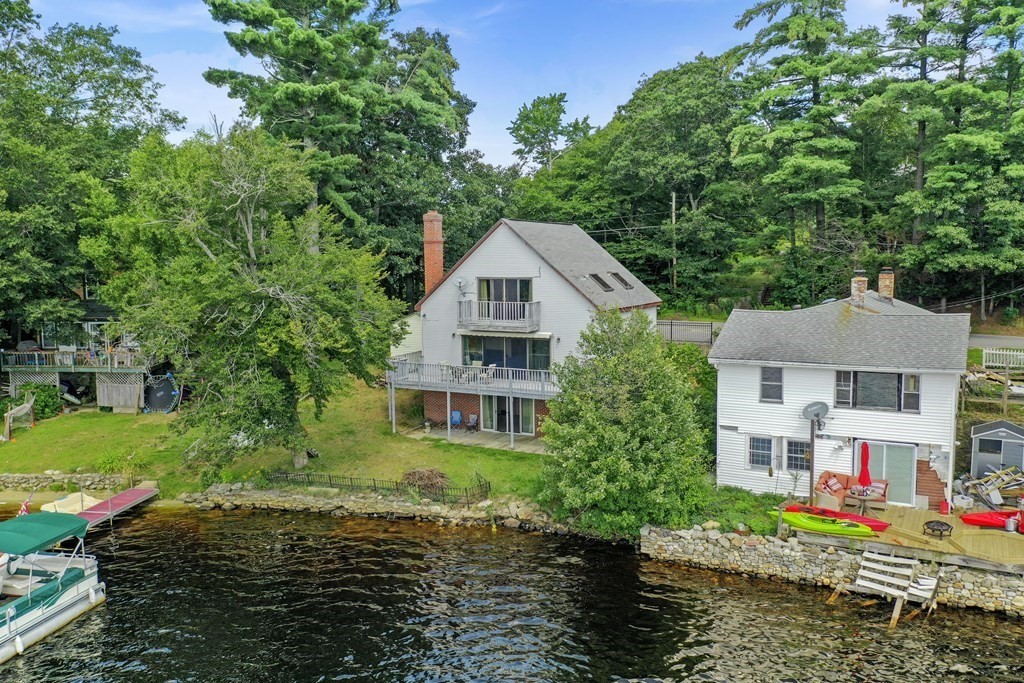 353 Rindge Turnpike Ashburnham, MA 01430 - Photo 2 of 38 a front view of a house with a yard