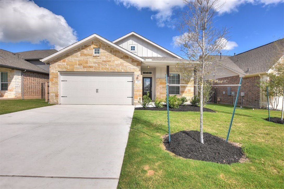 704 Bonnet Boulevard Georgetown, TX 78628 - Photo 1 of 1 a view of a house with a yard and porch