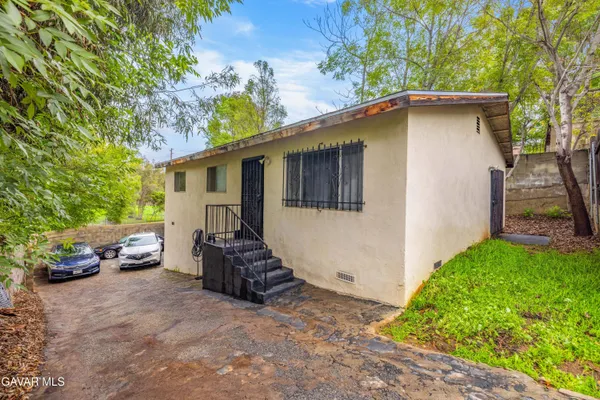 a view of a house with a patio
