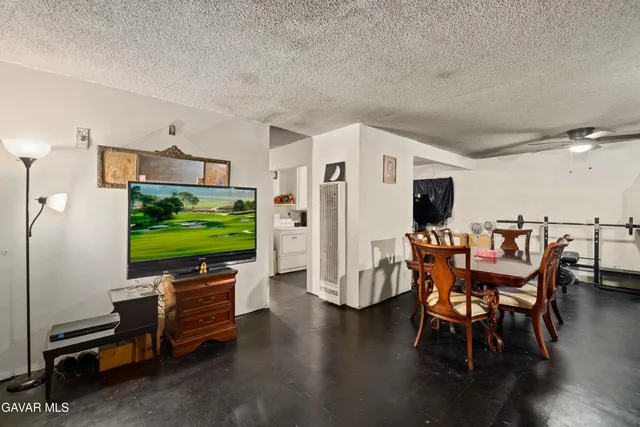 a kitchen with a sink dishwasher a refrigerator and a stove