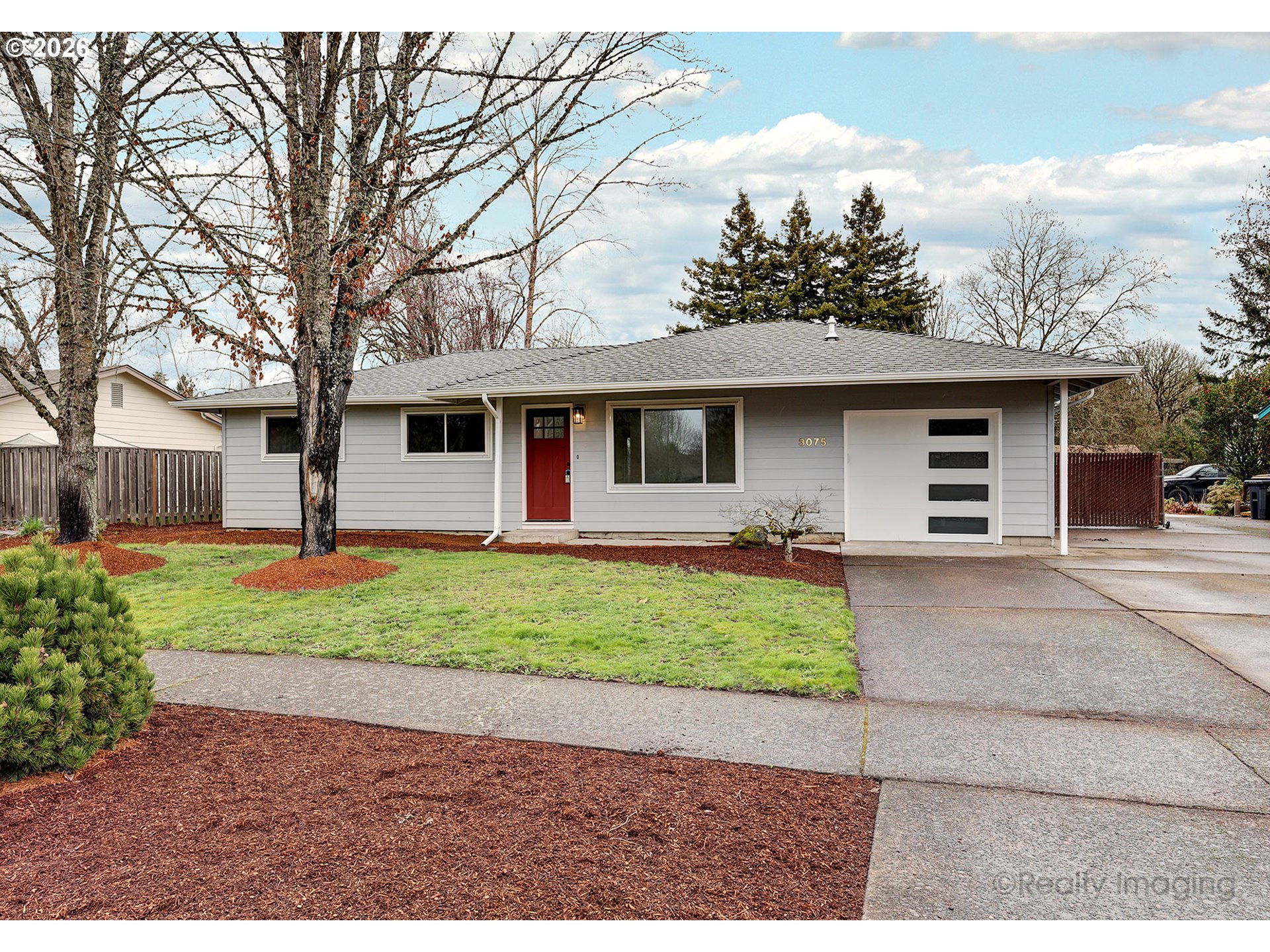 3075 Northeast Lancaster Street Corvallis, OR 97330 - Photo 1 of 13 a front view of a house with garden