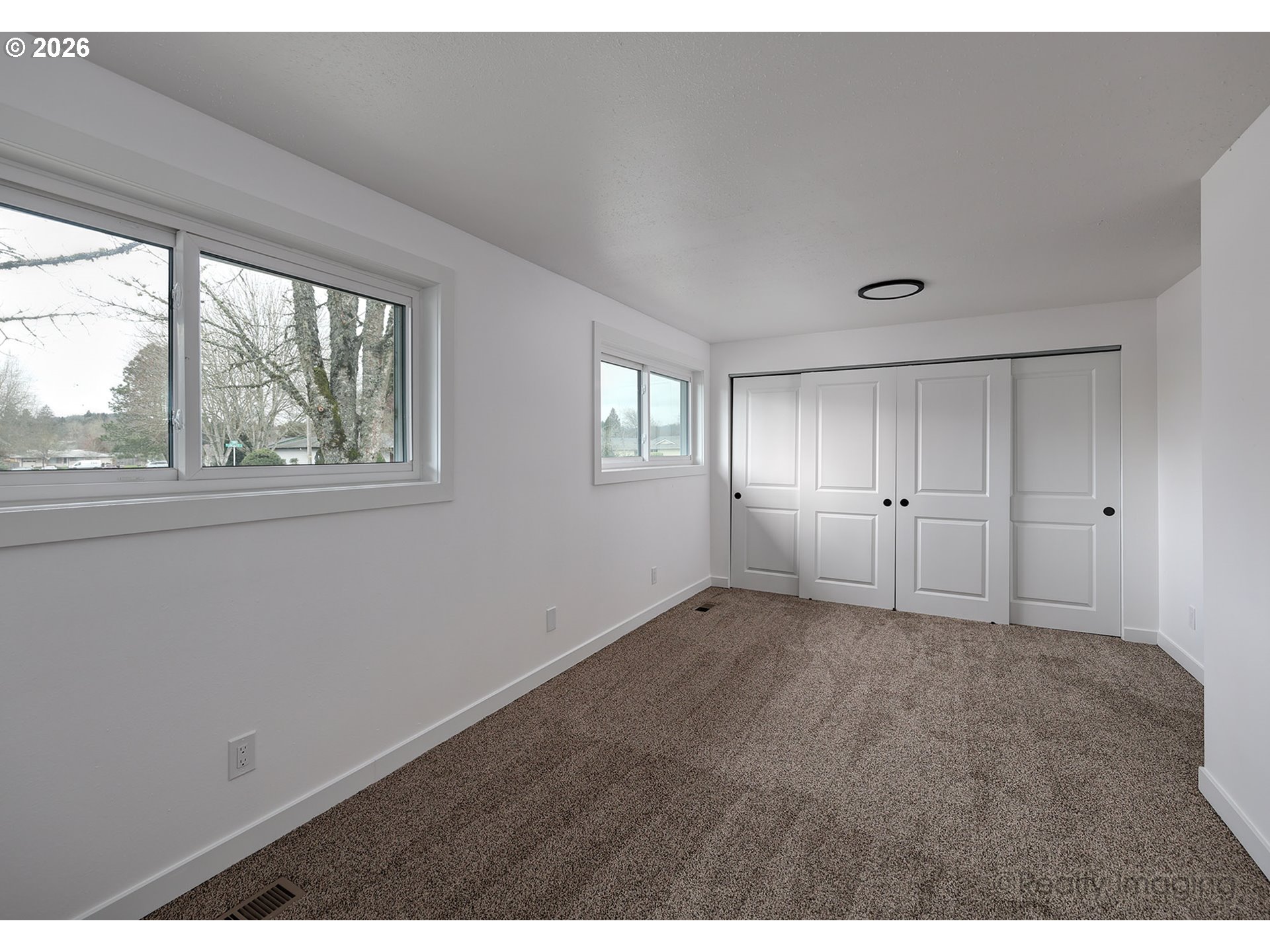3075 Northeast Lancaster Street Corvallis, OR 97330 - Photo 9 of 13 a view of an empty room with window