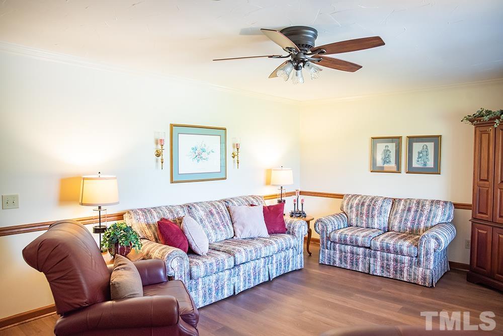2240 Chub Lake Road Roxboro, NC 27574 - Photo 54 of 54 a living room with furniture and a couch