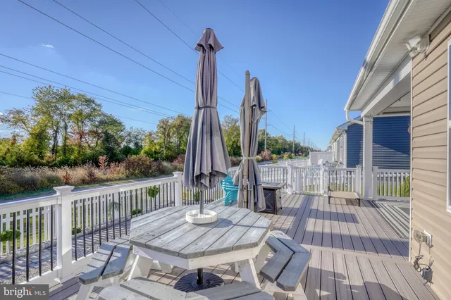 a view of a balcony with furniture