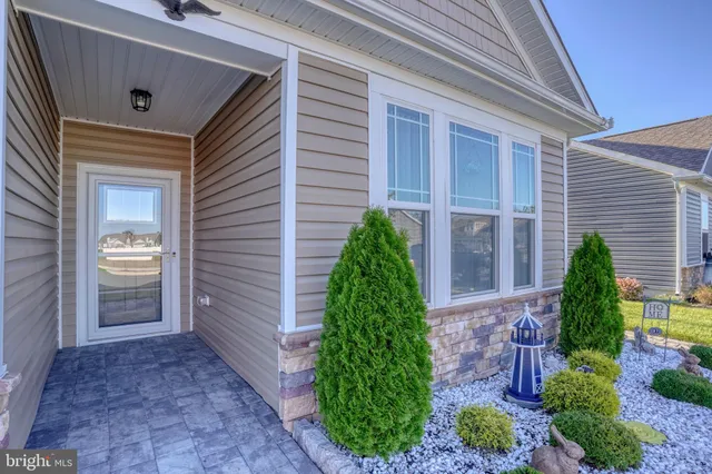 a house view with a backyard space