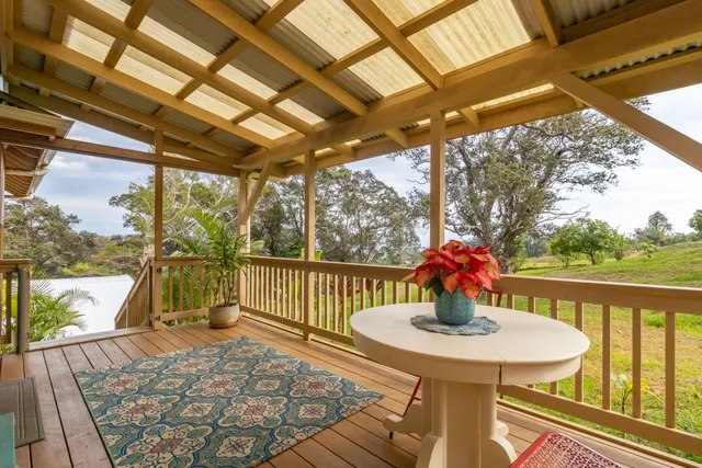 a view of a balcony with furniture