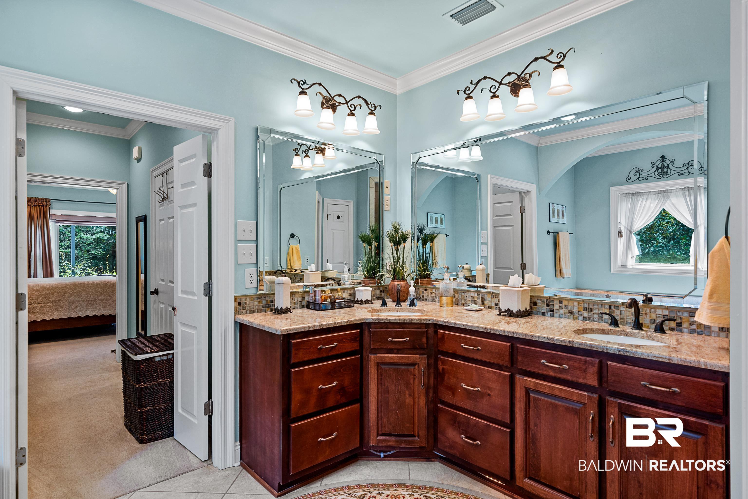 31990 Merriwether Court Daphne, AL 36527 - Photo 34 of 53 Double vanities and separate water closet
