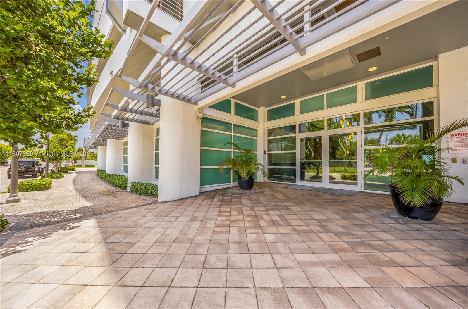 315 Northeast 3rd Avenue, Unit 1809 Fort Lauderdale, FL 33301 - Photo 23 of 32 a view of a house with a porch