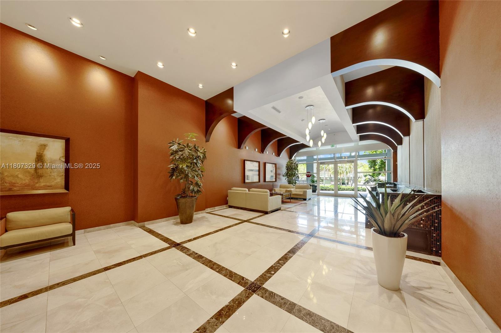 315 Northeast 3rd Avenue, Unit 1809 Fort Lauderdale, FL 33301 - Photo 24 of 32 a living room with furniture and floor to ceiling window