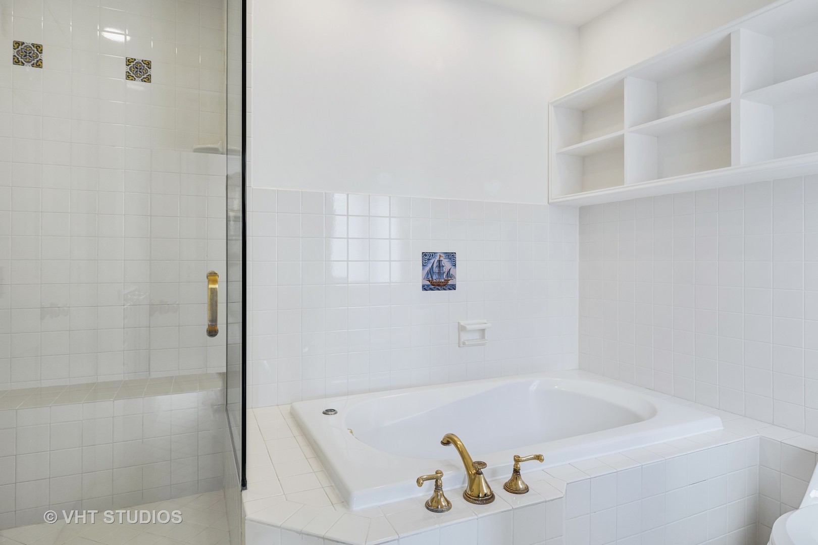 82 Warwick Road Winnetka, IL 60093 - Photo 15 of 23 a bathroom with a tub and shower