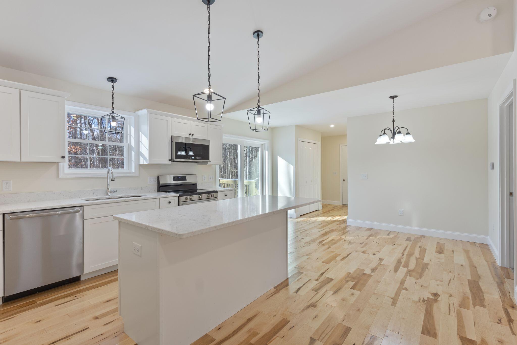 13 Quaker Lane Limerick, ME 04048 - Photo 11 of 57 Kitchen open to dining area