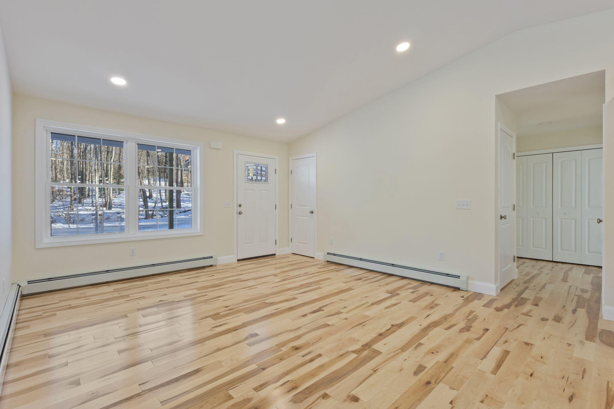 13 Quaker Lane Limerick, ME 04048 - Photo 18 of 57 Living room with real wood flooring