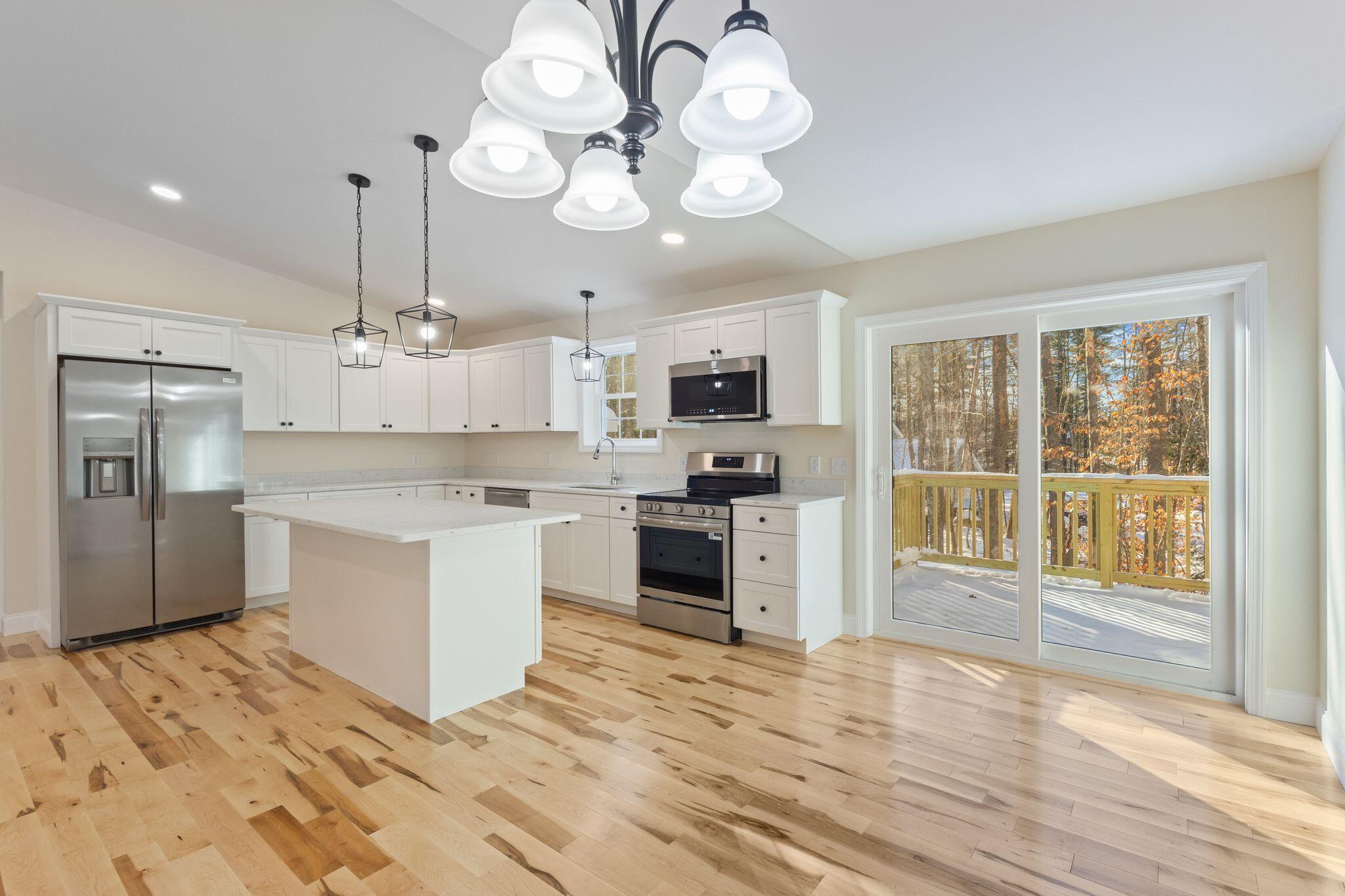 13 Quaker Lane Limerick, ME 04048 - Photo 7 of 57 Kitchen with slider to deck