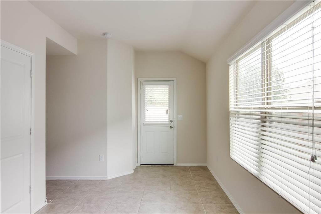 5916 Kennedy Street Austin, TX 78747 - Photo 7 of 25 a view of an empty room with a window