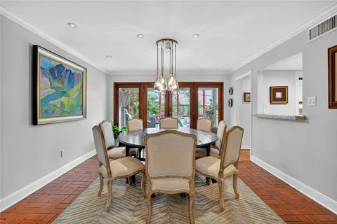 a kitchen area with stainless steel appliances granite countertop a microwave and a sink