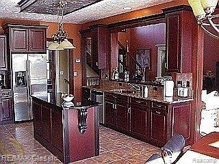 59953 9 Mile Road South Lyon, MI 48178 - Photo 5 of 17 GORMET KITCHEN WITH ISLAND