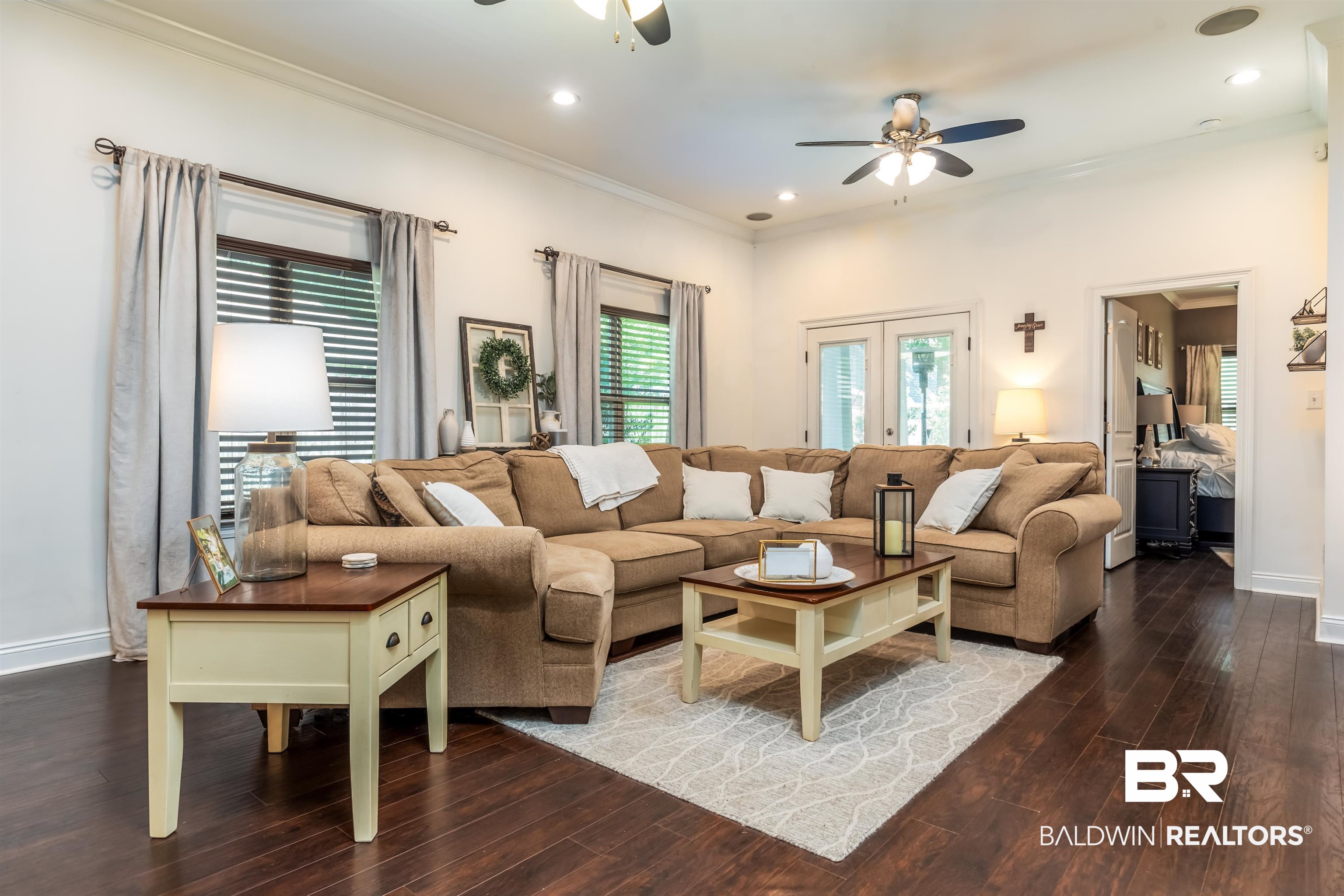 965 Henckley Avenue Mobile, AL 36609 - Photo 5 of 30 Living room featuring ceiling fan, hardwood / wood-style floors, crown molding, and french doors