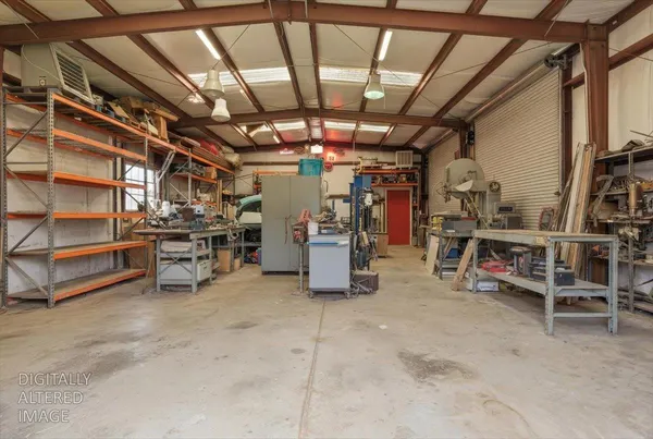 a view of backyard with outdoor seating and green space