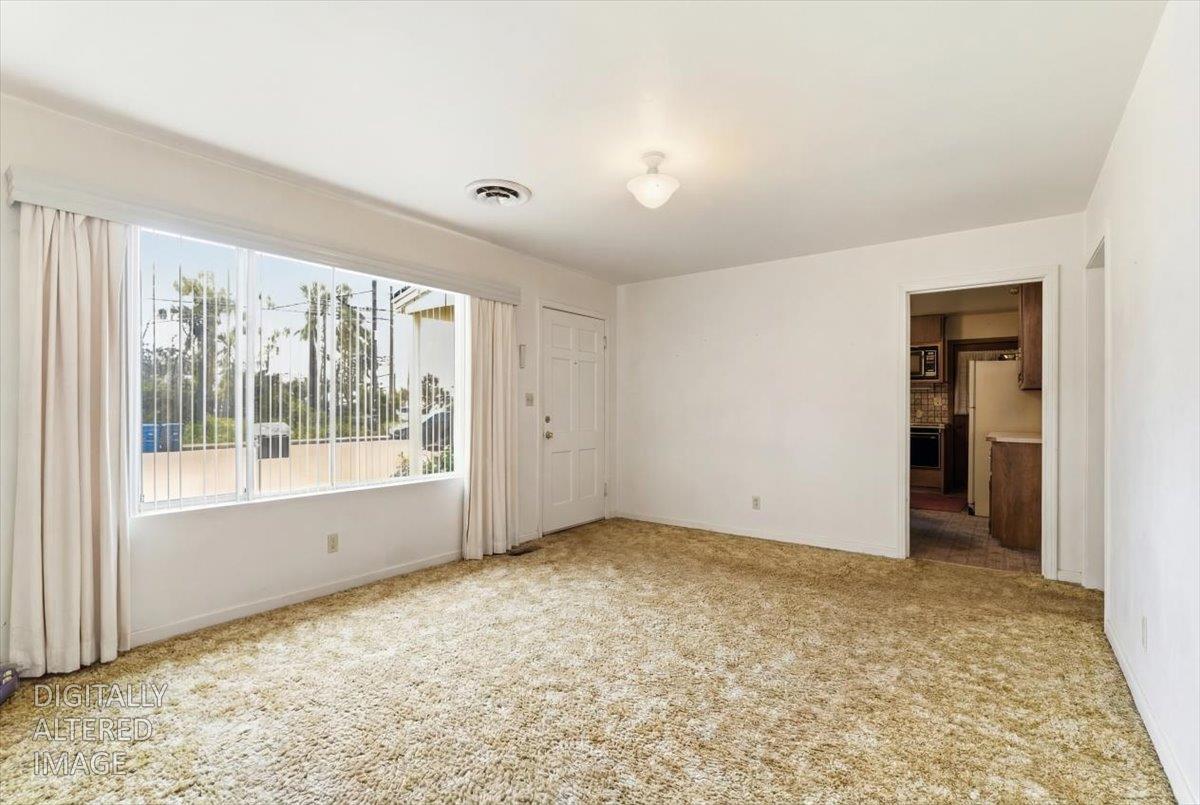 1833 Richard Way Ceres, CA 95307 - Photo 4 of 21 an empty room with windows