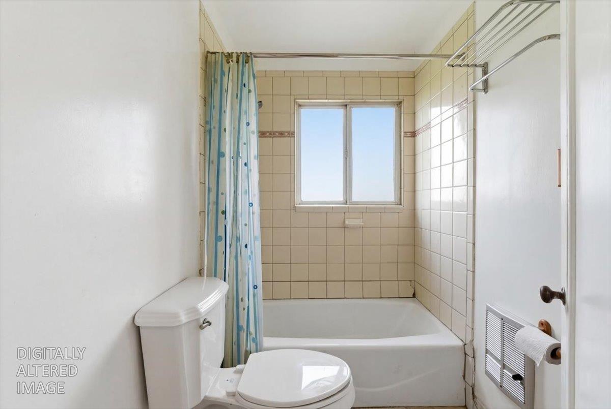 1833 Richard Way Ceres, CA 95307 - Photo 6 of 21 a bathroom with a toilet and shower