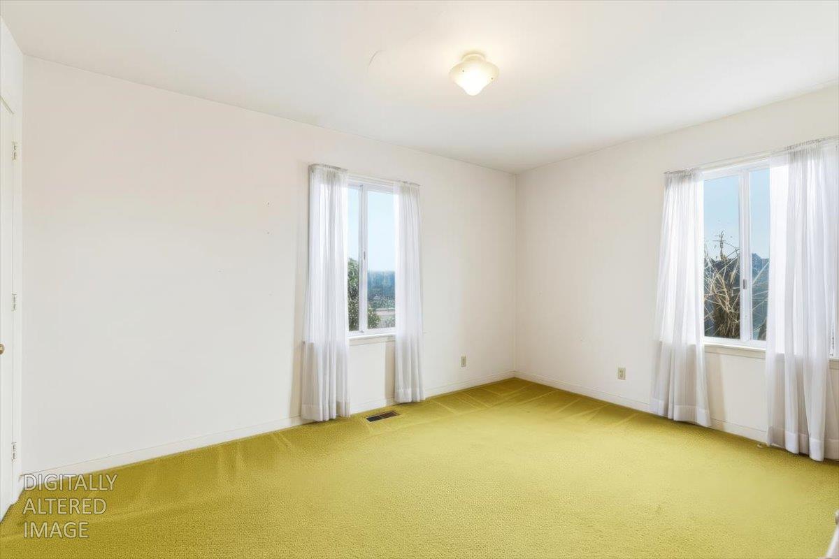 1833 Richard Way Ceres, CA 95307 - Photo 9 of 21 an empty room with windows