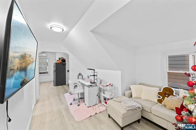 a living room with furniture and a couch