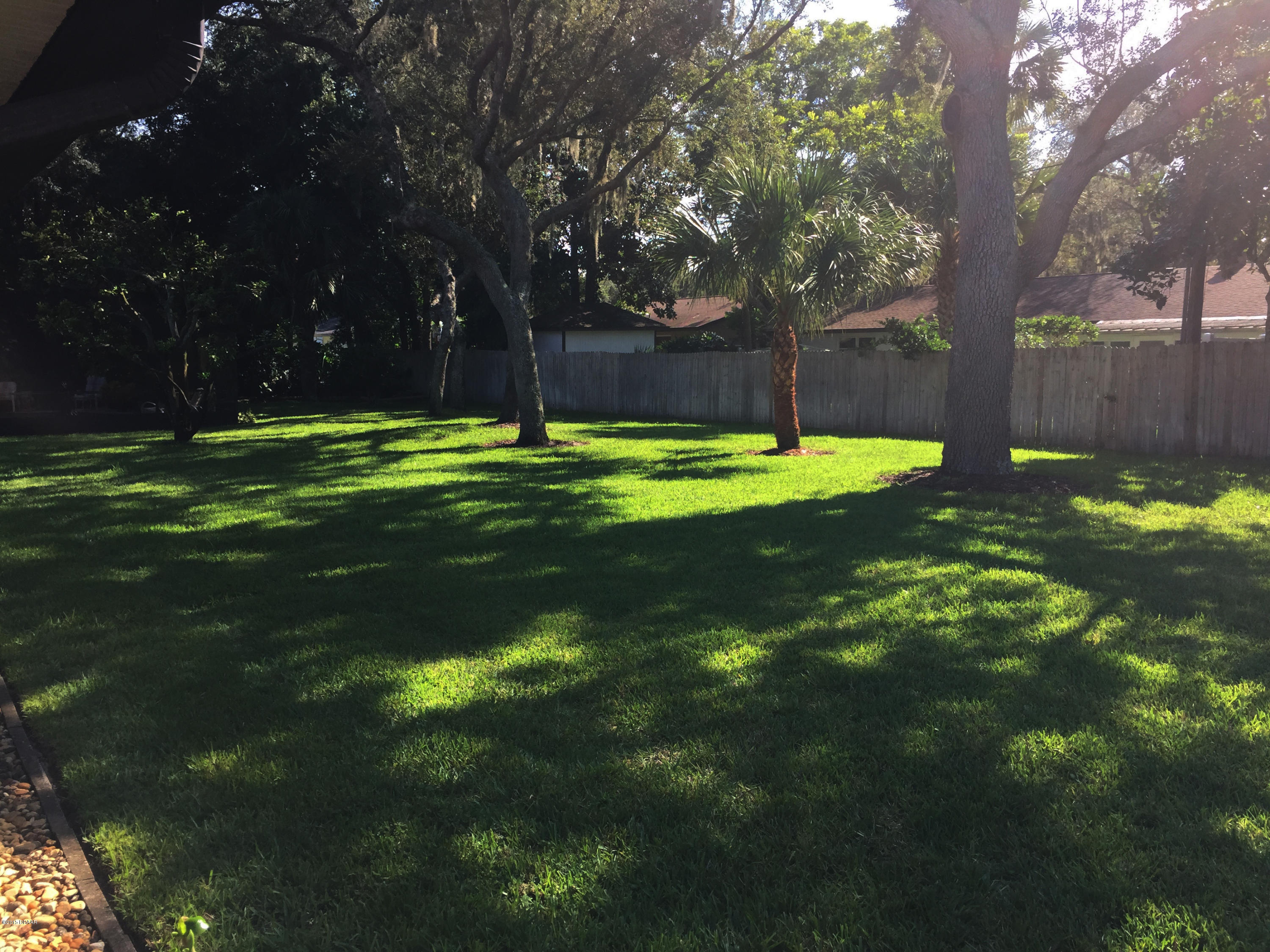 18 Mayfield Terrace Ormond Beach, FL 32174 - Photo 16 of 17 a view of a backyard