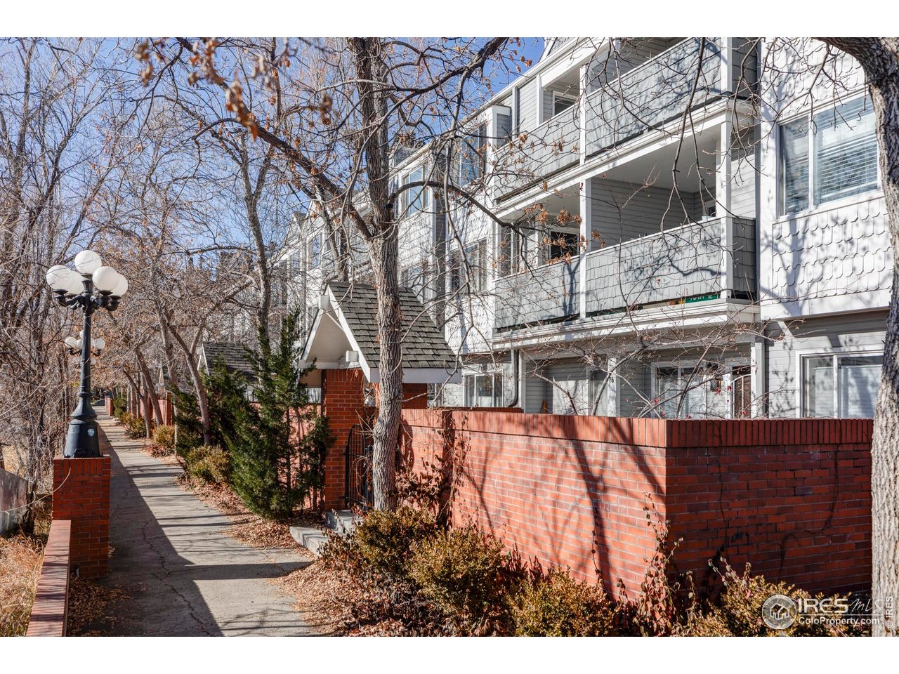 2201 Pearl Street, Unit 224 Boulder, CO 80302 - Photo 18 of 19 Nestled in the well-maintained Whittier Square community, you'll enjoy beautiful courtyards, cobblestone pathways, and the ease of no-maintenance living while the HOA covers trash, water, sewer, landscaping, snow removal, and building maintenance.