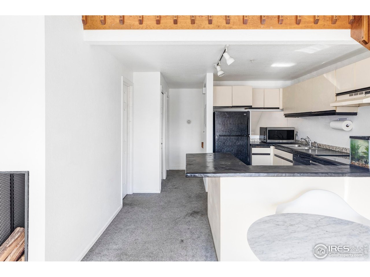 2201 Pearl Street, Unit 224 Boulder, CO 80302 - Photo 6 of 19 Generous prep space and a breakfast bar.