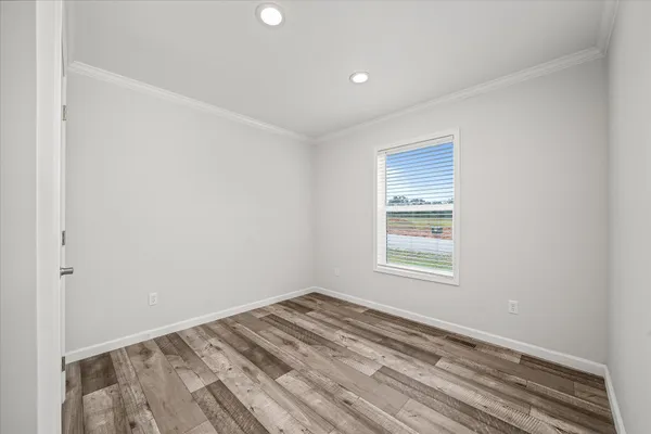 a view of a room that has a window in it