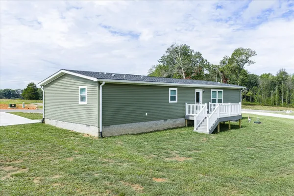 a house view with a garden space