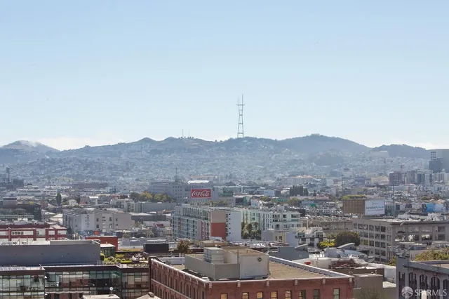 a view of city with tall buildings